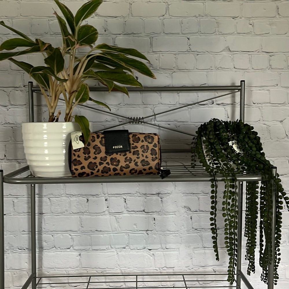 Never used FOSSIL cheetah print clutch